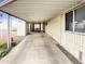 Long covered carport for off-street parking at 25 S 102Nd St # 73, Mesa, AZ 85208
