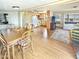 Open floor plan with a dining area and a view into the living room and kitchen at 25 S 102Nd St # 73, Mesa, AZ 85208
