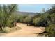 Community walking path surrounded by desert landscaping at 30406 N 116Th Ln, Peoria, AZ 85383