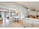 Open kitchen and living area with modern appliances and stylish decor throughout the space at 3149 W Danbury Dr, Phoenix, AZ 85053