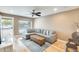 Inviting living room with comfortable seating, hardwood floors, and natural light at 3149 W Danbury Dr, Phoenix, AZ 85053