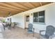 Covered patio with outdoor seating, ceiling fans, and a view of the backyard at 3149 W Danbury Dr, Phoenix, AZ 85053