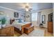 Bright bedroom with wood floors, ceiling fan, and a large area rug at 3270 W White Canyon Rd, San Tan Valley, AZ 85144