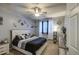 Stylish bedroom with a sleek design, decorative wall art, and ample natural light creating a serene ambiance at 3270 W White Canyon Rd, San Tan Valley, AZ 85144