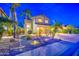 Beautiful home featuring mature palm trees, professionally landscaped yard, and a spacious driveway at 3270 W White Canyon Rd, San Tan Valley, AZ 85144