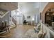 Open-concept living area with high ceilings, a staircase, and stylish furnishings, perfect for modern living at 3270 W White Canyon Rd, San Tan Valley, AZ 85144