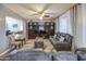 Relaxing living room featuring a custom entertainment center and comfortable seating at 3270 W White Canyon Rd, San Tan Valley, AZ 85144