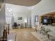 Spacious living area with comfortable seating, high ceilings, and natural light at 3270 W White Canyon Rd, San Tan Valley, AZ 85144