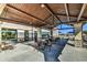 Inviting outdoor seating area with stone pillars, covered pergola, and scenic mountain views, perfect for community gatherings at 3270 W White Canyon Rd, San Tan Valley, AZ 85144