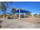 Shaded playground with picnic tables offering a fun and relaxing space for families to enjoy outdoor activities at 3270 W White Canyon Rd, San Tan Valley, AZ 85144