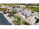 Desert homes are shown from an aerial view with golf course and natural vegetation visible at 32771 N 70Th St, Scottsdale, AZ 85266