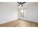 Light, airy bedroom with a window and a ceiling fan at 32771 N 70Th St, Scottsdale, AZ 85266
