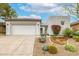 Charming single-story home featuring a two-car garage and low-maintenance desert landscaping at 32771 N 70Th St, Scottsdale, AZ 85266