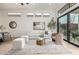 Stylish living room featuring comfortable seating, contemporary decor, and abundant natural light at 32771 N 70Th St, Scottsdale, AZ 85266