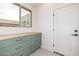 Mudroom featuring custom sage colored cabinets, drawers, and window letting in natural light at 32771 N 70Th St, Scottsdale, AZ 85266