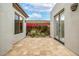 Private outdoor patio with tiled flooring, perfect for relaxation and enjoying the desert ambiance at 32771 N 70Th St, Scottsdale, AZ 85266
