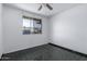 Unfurnished bedroom with ceiling fan, and green tile flooring at 339 E 9Th Dr, Mesa, AZ 85210