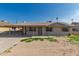 Charming single-story home featuring a covered carport and a low-maintenance front yard at 339 E 9Th Dr, Mesa, AZ 85210