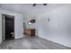 Additional living space featuring tile floors, kitchenette, and a view into the shower area at 339 E 9Th Dr, Mesa, AZ 85210