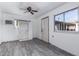 Additional living space showcasing tile floors, a corner air conditioner, and a window at 339 E 9Th Dr, Mesa, AZ 85210