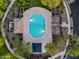 Overhead aerial view of the community pool surrounded by sitting areas and landscaping at 3678 E Yeager Ct, Gilbert, AZ 85295