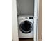 Convenient laundry closet with a modern, front-loading washing machine at 3737 E Turney Ave # 223, Phoenix, AZ 85018