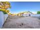 Backyard with a fence and shed at 3906 W Aire Libre Ave, Phoenix, AZ 85053