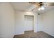 Cozy bedroom features neutral carpet, closet and ceiling fan at 3906 W Aire Libre Ave, Phoenix, AZ 85053