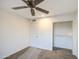 Bedroom showcasing a closet and ceiling fan at 3906 W Aire Libre Ave, Phoenix, AZ 85053