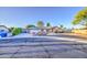 Charming single story home featuring a spacious driveway, two-car garage, and brick accents at 3906 W Aire Libre Ave, Phoenix, AZ 85053