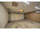 Spacious garage with concrete flooring at 3906 W Aire Libre Ave, Phoenix, AZ 85053