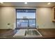 A large window brightens the kitchen sink with views of the front yard at 3906 W Aire Libre Ave, Phoenix, AZ 85053