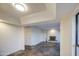 Spacious living room with tile floors and fireplace at 3906 W Aire Libre Ave, Phoenix, AZ 85053
