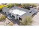 Stylish home with desert landscaping, well-maintained roof, and mature trees providing ample shade and privacy at 4035 E Mcdonald Dr, Phoenix, AZ 85018