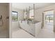 Bright bathroom features a double vanity, sleek fixtures, and a window offering natural light and a view at 4035 E Mcdonald Dr, Phoenix, AZ 85018