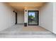 Welcoming front porch with a modern door, stylish black accents, and clear numbering of the house number at 4035 E Mcdonald Dr, Phoenix, AZ 85018