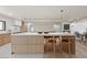 Modern kitchen with a marble island, stylish cabinetry, and stainless steel appliances for a gourmet experience at 4035 E Mcdonald Dr, Phoenix, AZ 85018