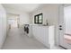 Well-organized laundry room features modern washer/dryer, sink, and window at 4035 E Mcdonald Dr, Phoenix, AZ 85018