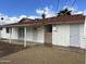 View of the back of the house featuring a covered patio and back doors at 4701 N 39Th Dr, Phoenix, AZ 85019
