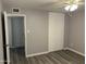 Bedroom view showcases wood-look floors, bi-fold closet doors, and a neutral color palette at 4701 N 39Th Dr, Phoenix, AZ 85019
