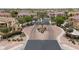Community entrance showcases a grand entrance with manicured landscaping and an American flag at 4777 S Fulton Ranch Blvd # 1050, Chandler, AZ 85248