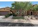 Exterior home showcasing stone accents, a tiled roof, and well-maintained landscaping at 4777 S Fulton Ranch Blvd # 1050, Chandler, AZ 85248
