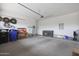 Organized garage space with storage solutions and ample room for multiple vehicles at 4777 S Fulton Ranch Blvd # 1050, Chandler, AZ 85248