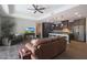 Open floor plan of living room and kitchen area with access to outdoor patio at 4777 S Fulton Ranch Blvd # 1050, Chandler, AZ 85248