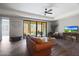 Inviting living room with tile floors, ceiling fan and sliding glass door to patio at 4777 S Fulton Ranch Blvd # 1050, Chandler, AZ 85248