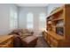 Inviting office featuring light walls, arched windows, and an elegant leather lounging chair at 4777 S Fulton Ranch Blvd # 1050, Chandler, AZ 85248
