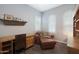 A cozy office space with hardwood floors, a traditional desk, and a comfortable leather chair at 4777 S Fulton Ranch Blvd # 1050, Chandler, AZ 85248