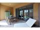 Cozy patio with outdoor dining set and lounge chair, perfect for relaxation and entertaining at 4777 S Fulton Ranch Blvd # 1050, Chandler, AZ 85248
