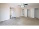 Bedroom boasts carpet, ceiling fan, access to closet and ensuite bathroom at 514 E Barrus Pl, Casa Grande, AZ 85122