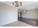 Dining space with tile flooring leading to the living room and bright natural light at 514 E Barrus Pl, Casa Grande, AZ 85122